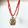Large Ganesh and knotted coral necklace