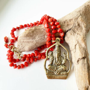 coral knotted necklace and large ganesh pendant